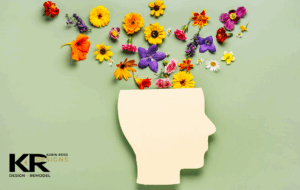 A silhouette of a head with flowers exploding from out the top indicate that this is about interior design and mental health.